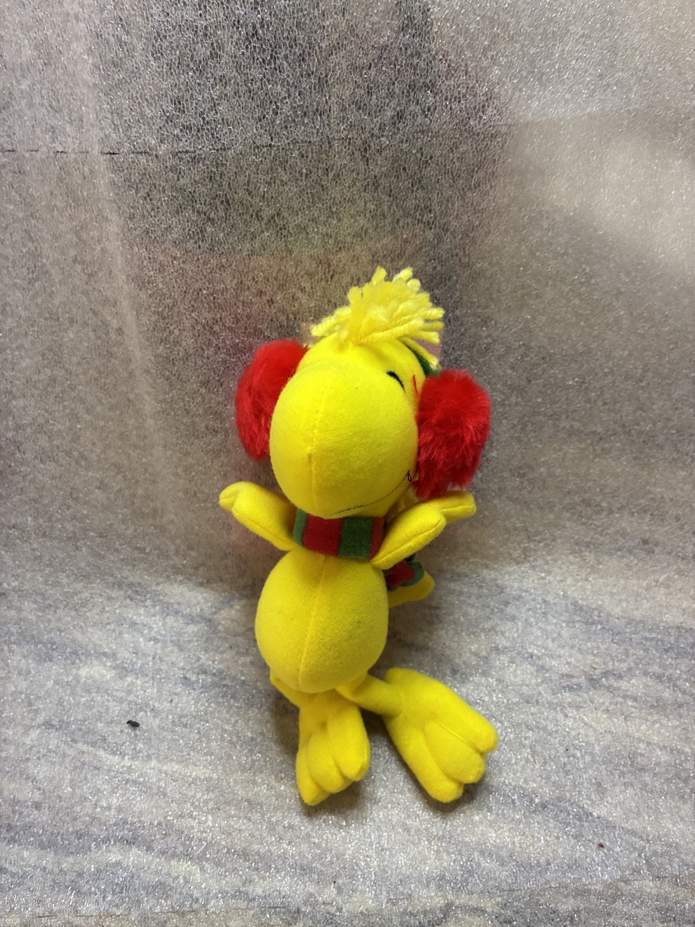 Hallmark Woodstock with Red Ear Muffs and Striped Scarf